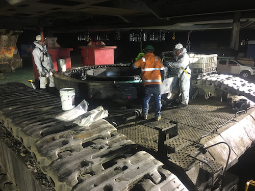 Three Man Working On Parts Of Machine - Diesel Mechanic in Harristown, QLD