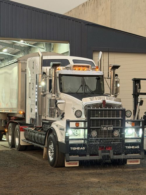 Heavy-duty Truck and Trailer Inside a Diesel Workshop With a Forklift Nearby — Toowoomba Heavy Diesel in Harristown, QLD